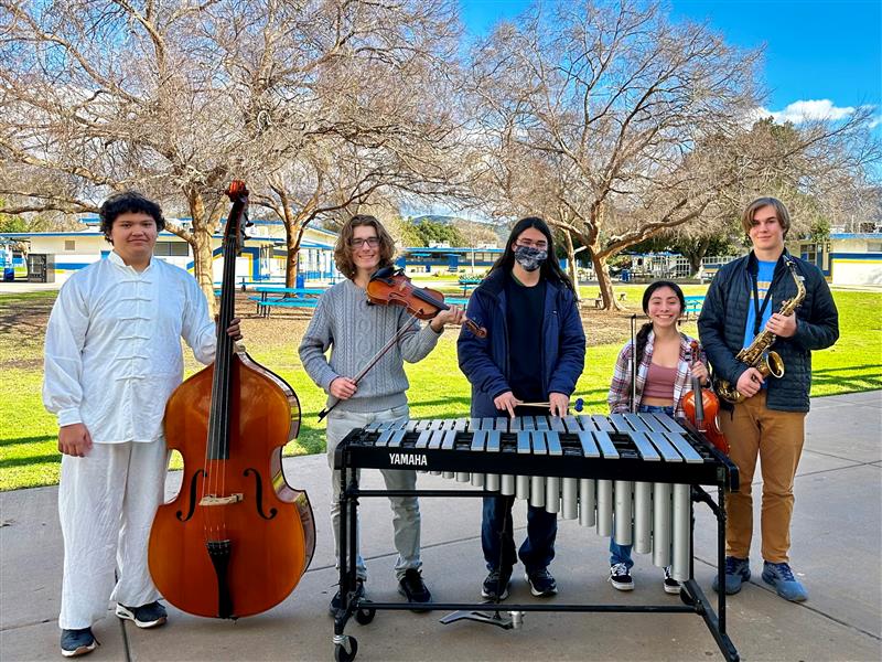 SCORE Students poser with their instruments