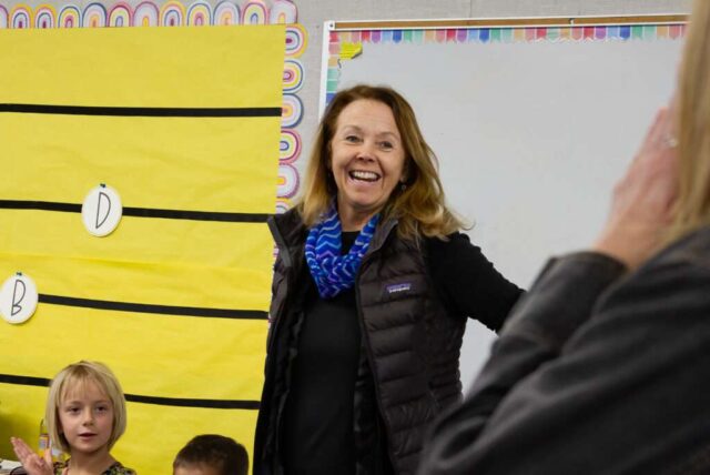 Ms. Laura smiling